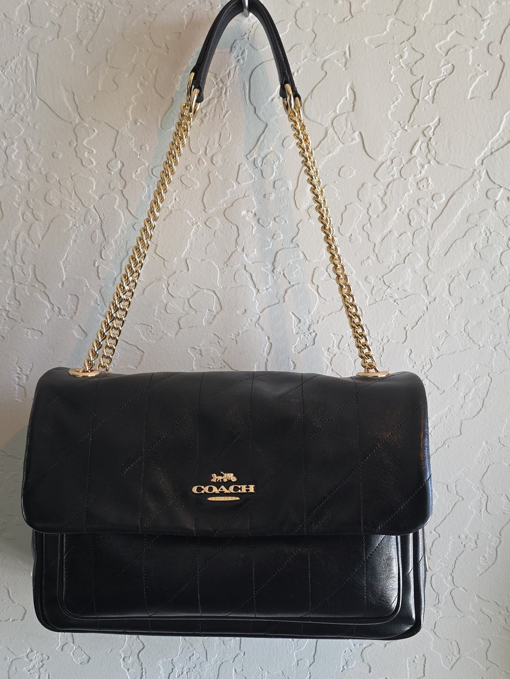 Coach Elodie Black Quilted Leather Shoulder Bag with Gold Chain Strap